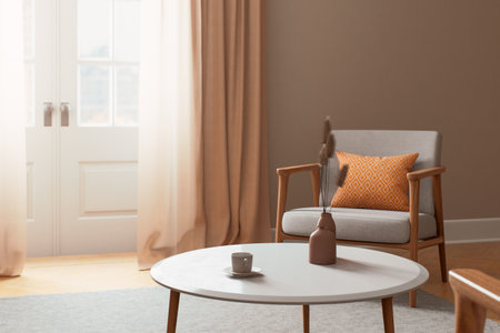 A modern and cozy living room design that features an abundance of natural light and stylish decorの写真素材