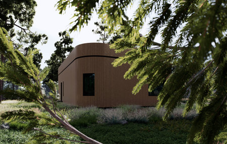 A Modern Wooden Cabin Nestled Amongst Lush Green Forest and Natural Surroundingsの写真素材