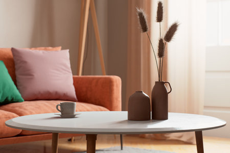 Stylish living room with modern decor in combination with cozy elements for inviting comfortの写真素材