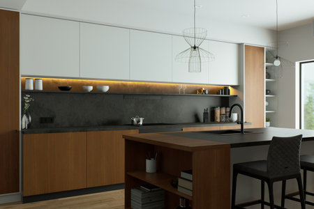 This is a modern kitchen that features a minimalist design along with soothing ambient lightingの写真素材
