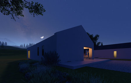 A Serene and Modern Home Nestled Beneath a Starry Night Sky Full of Twinkling Starsの写真素材