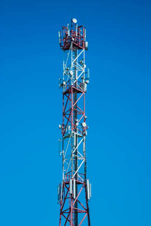 Telecommunications equipment located on the towerの写真素材