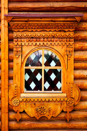 Stained glass window in a wooden houseの写真素材