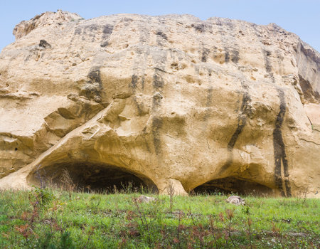 Hike in the Karachay - Cherkess Republic mountains. Hiking in unusual natural landscapes. Fantastic forms sandstone formations.の写真素材