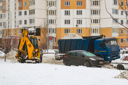 Michael Lunn Street, Balashikha, Russia-January 23, 2021. Mechanized cleaning of fallen snow with the help of harvesting equipment.のeditorial素材