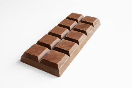 Chocolate. Exquisite chocolate bar close-up. On a white background.の写真素材