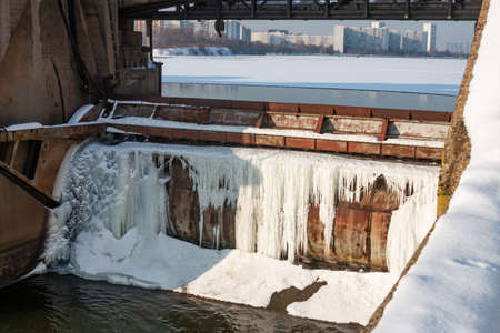 Water discharge during the spring flood at the Perervinskaya dam on the Moskva River. The dam is a close-up.の写真素材