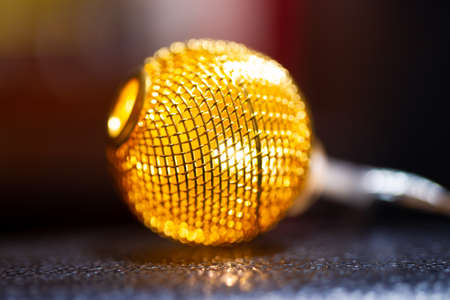 Battery garland with metallic grid balls on blurred background. Closeup view.の写真素材