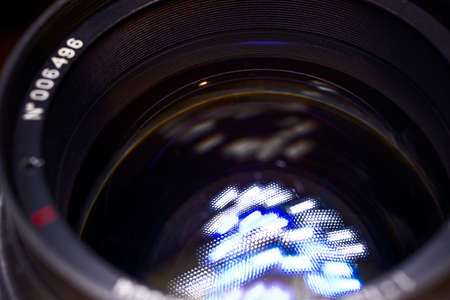 Vintage old lens low light photo closeup. White traces on glass.の写真素材