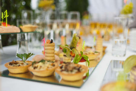 table setting banquets buffet delicious canapes holidayの写真素材