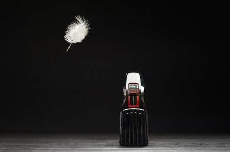 hair trimmer closeup on a black backgroundの写真素材