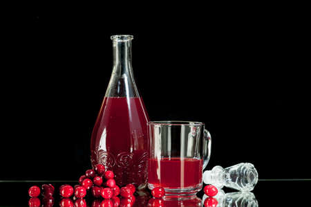 Red liquor, cranberry juice, cranberry juice Isolated on a black background.の写真素材