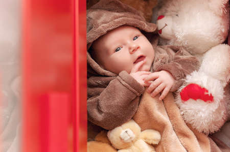 Baby sleeping with her teddy bear, new family and love concept Soft focus and blurry