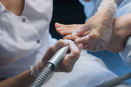 A professional technician grinding machine, nail polish, professional nail care the hands and feetの写真素材