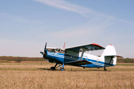 Vintage single-engine biplane aircraft ready to take offの写真素材