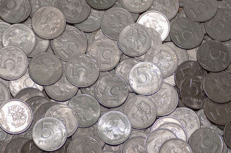 Russian coin five rubles, in large quantities. on coins backgroundの写真素材