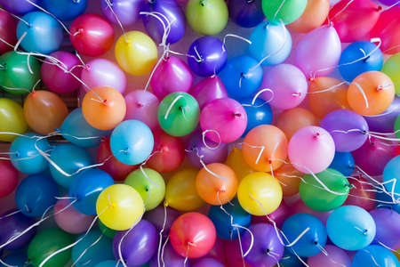 festive, colorful balloons with helium. attachment to the white ribbonsの写真素材