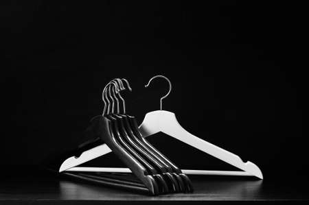 White hanger and a few black hangers, background, abstractの写真素材