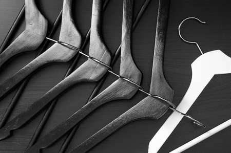 White hanger and a few black hangers, background, abstractの写真素材