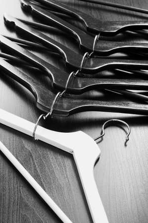 White hanger and a few black hangers, background, abstractの写真素材