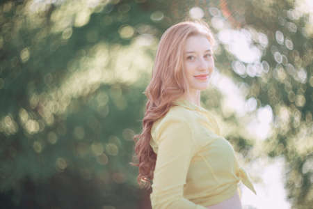 girl, beautiful, young, blonde, close up outdoor summerの写真素材