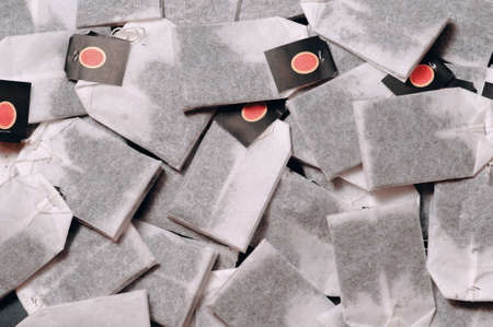 Tea bags on the table are lying backgroundの写真素材