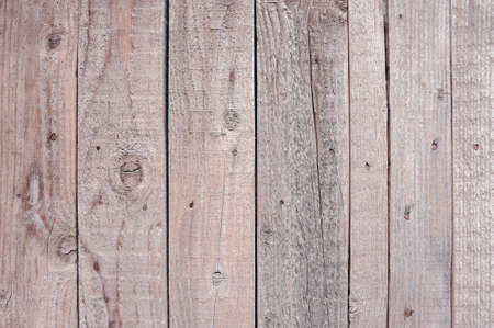 Texture of old dilapidated wooden boards with paint, antique wooden surface of hay, grunge wooden backgroundの写真素材
