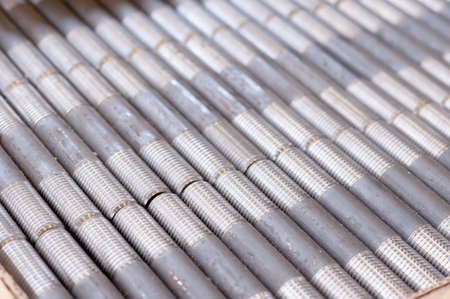 tubes with threaded threads. in production. finished parts in a row.の写真素材