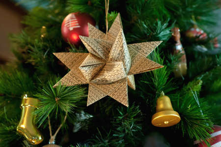 Paper, Christmas, six-pointed star on the branch of blue spruce, together with New Years toysの写真素材