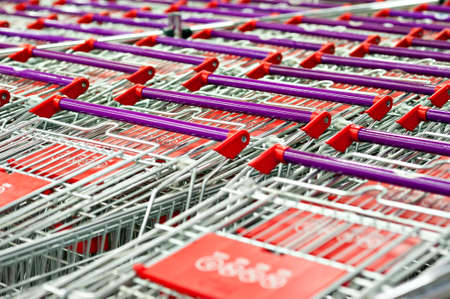Row of supermarket shopping cart trolleys vintage look.の写真素材
