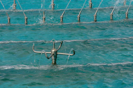 Close up water fountain in the pool.の写真素材
