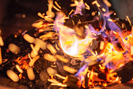 BBQ Grill Pit With Glowing And Flaming Hot Charcoal Briquettes, Food Background Or Texture,...