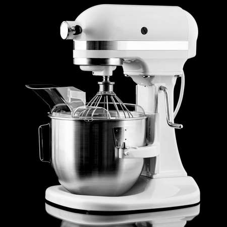 White kitchen mixer isolated on a black backgroundの写真素材