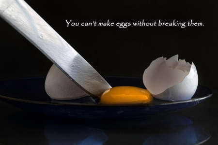 The concept of development, the ability to take risks. There's a broken egg on a blue plate....