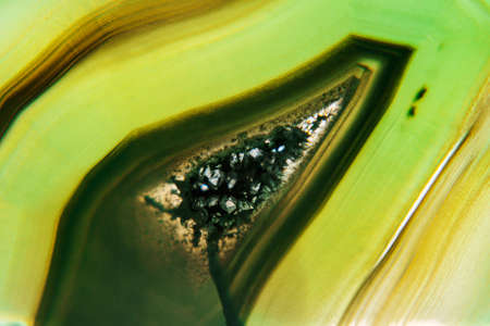Macro photo of malachite. Abstraction, texture, and backgrounds.