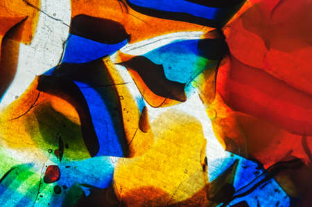 An abstract image consisting of correct and incorrect geometric shapes. Multi-colored tones.の写真素材