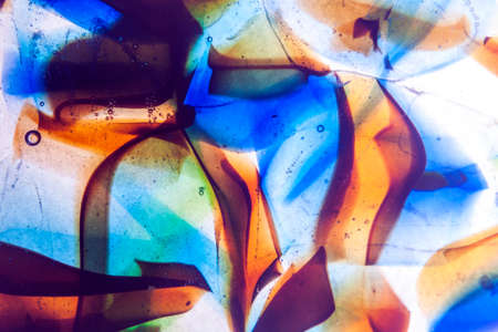 Abstract background of multicolored fused glass.の写真素材