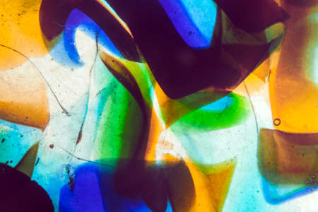 Abstract background of multicolored fused glass.の写真素材
