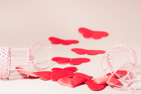 Of the two disclosed cell spill out of the heart. In the background, the connected hearts turn into butterflies.の写真素材