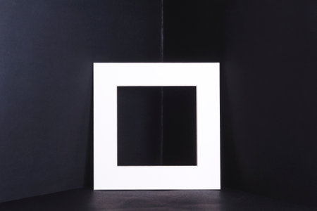 A white square frame in a dark corner.の写真素材