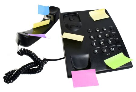 Black phone with stick notesの写真素材