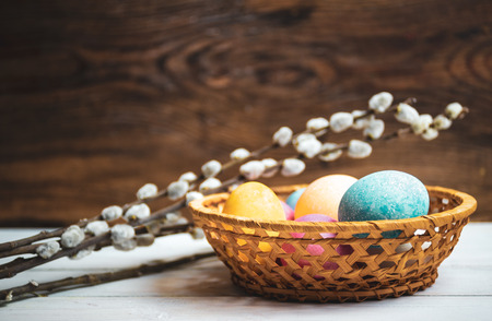 Easter eggs on rustic wooden background