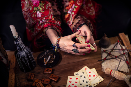 Gypsy fortune teller predicts the future with cardsの写真素材