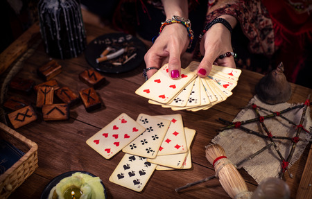 Gypsy fortune teller predicts the future with cardsの写真素材