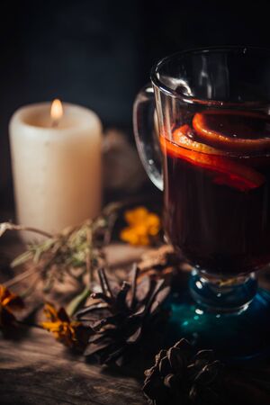 Glass of glintwein close up, rustic style, dark photoの写真素材