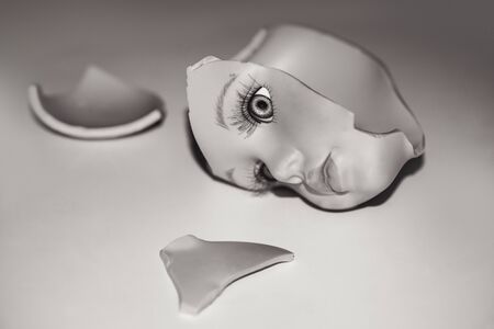 Broken head of the doll, abstractの写真素材