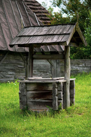 Old wooden well in Ukrainian village, countrysideの写真素材