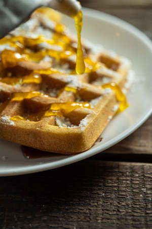 Home made Belgium wafers with topping and sugar fillingの写真素材