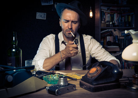 Retro private detective behind the desk, noir cinematic sceneの写真素材