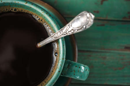 Freshly baked french baguette on a wooden backgroundの写真素材